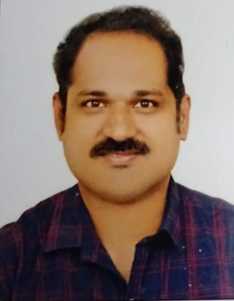 Dr. DESMON J THARAKAN